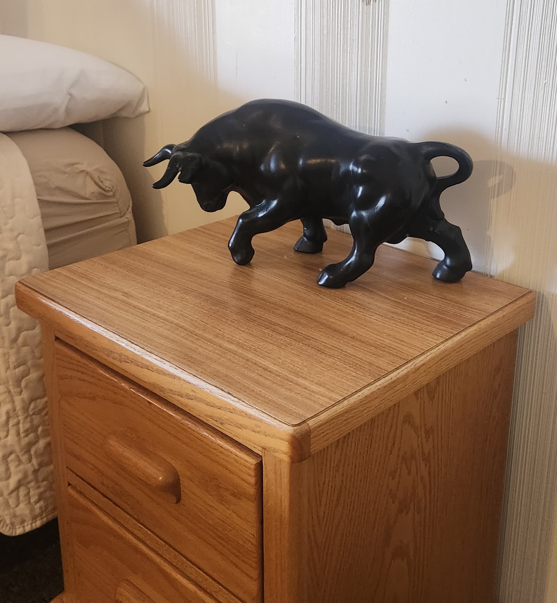 ceramic bull on night stand