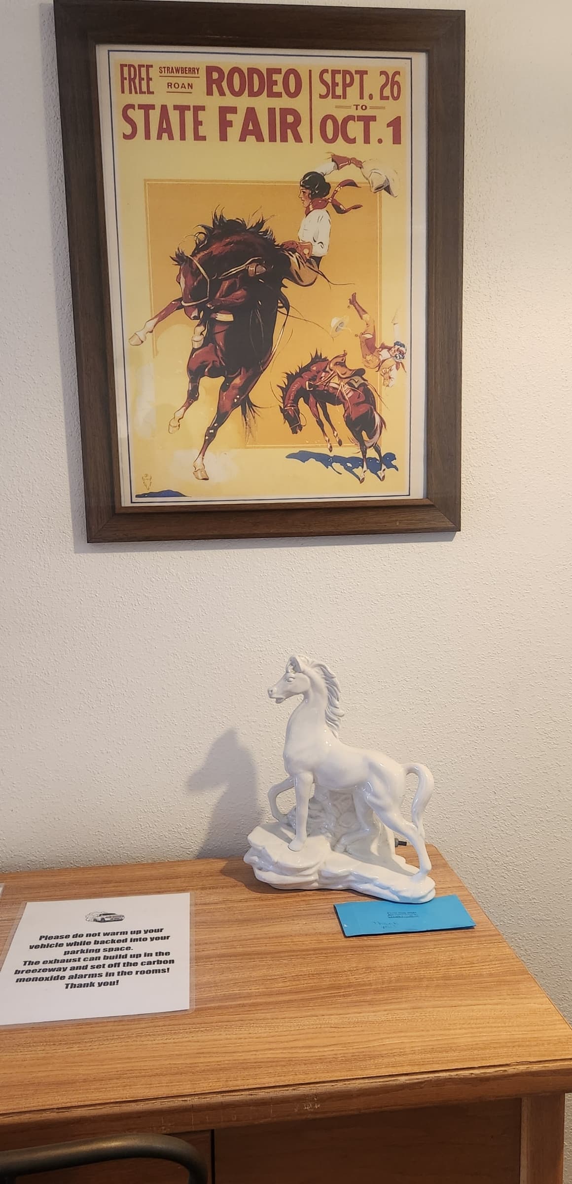 rodeo poster and ceramic horse